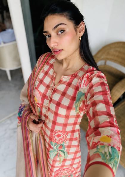 A checked kurta with floral print and dupatta