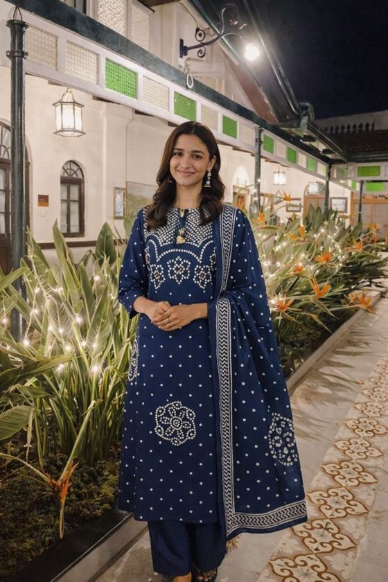 A navy bandhani kurta set with dupatta and palazzo